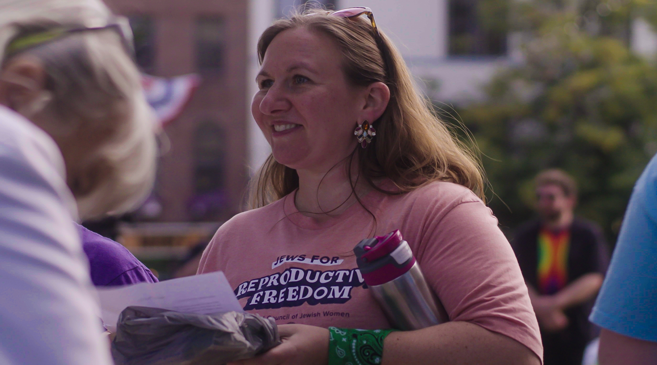 A woman named Elly shown in film at a protest in Indianapolis with the Hoosier Jews for Choice group. (Courtesy of “Under G-d”)