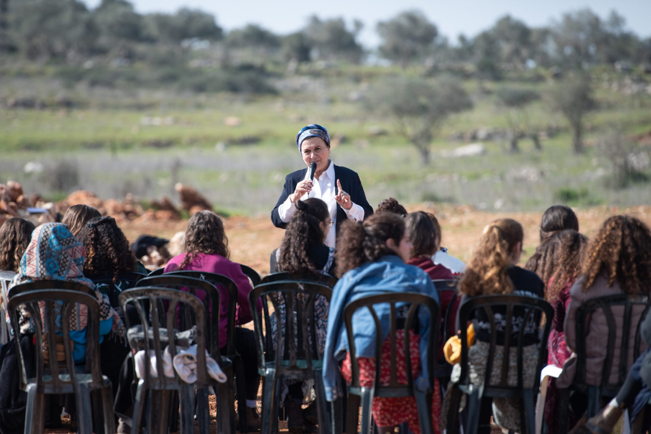 Settler leader Daniella Weiss speaks during a protest for the return to the Evyatar outspot, near the West Bank city of Nablus, Feb. 18, 2022.(Sraya Diamant/Flash90)