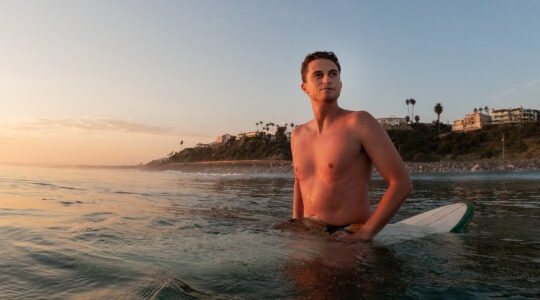 Josh Greene surfing