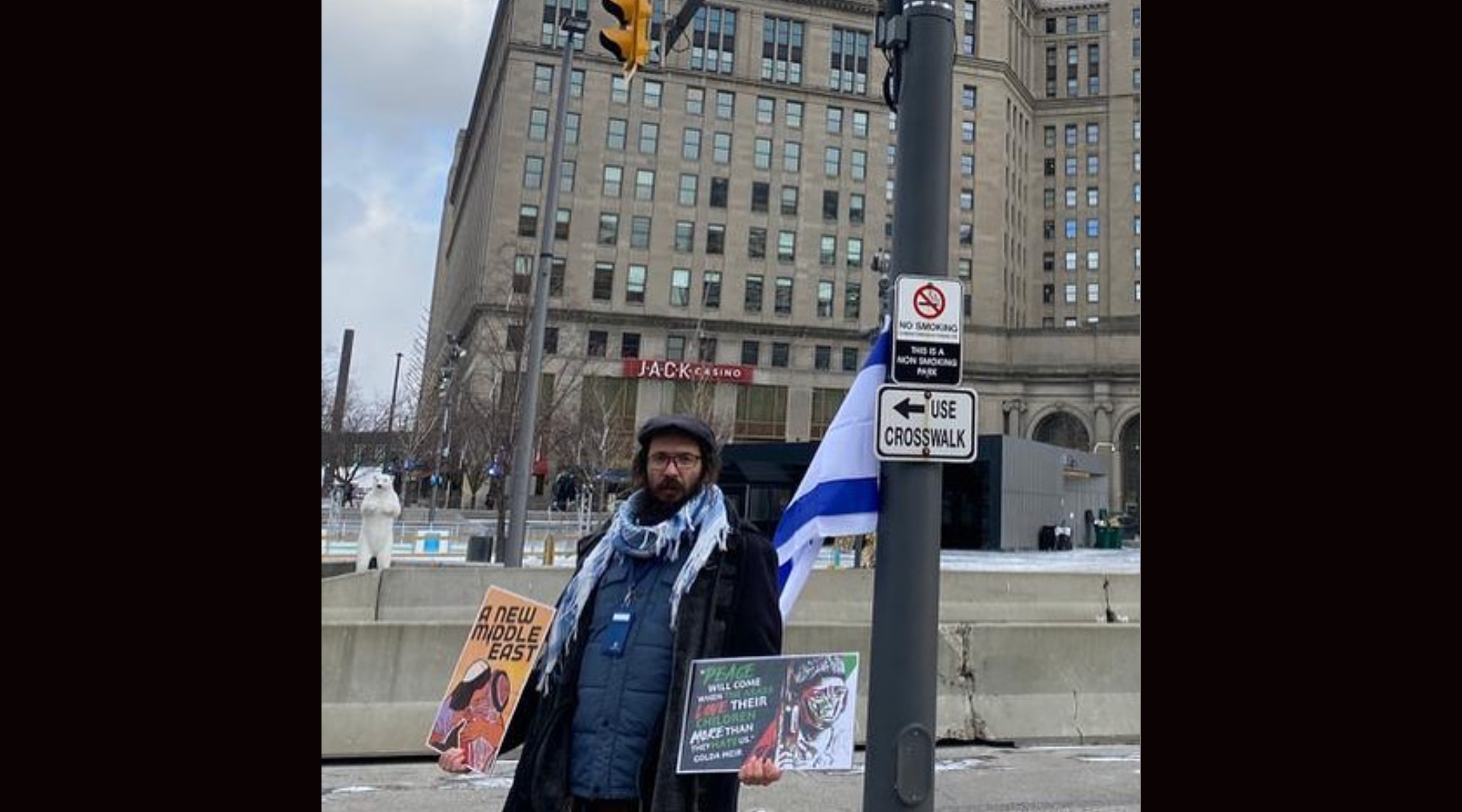After being barred from Cleveland State University, Rabbi Alex Popivker took to holding his anti-Palestinian protests on a street outside a local casino. (Courtesy Popivker)