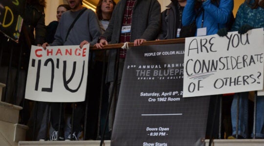 Students holding protest banners