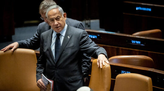 Israeli Prime Minister Benjamin Netanyahu seen during a vote in Knesset, the Israeli parliament in Jerusalem, on March 22, 2023. (Yonatan Sindel/Flash90)