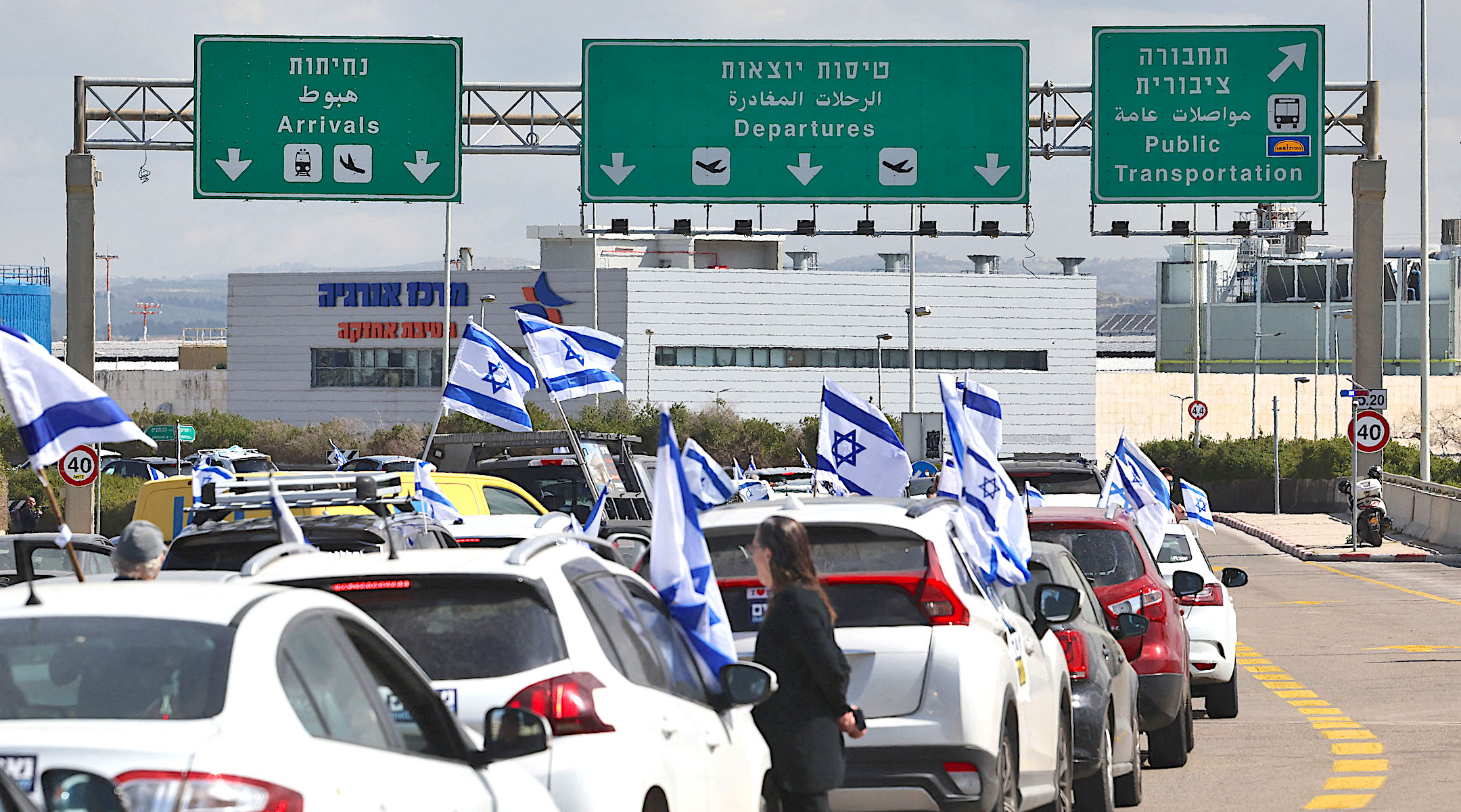Israelis protesting against the government’s controversial judicial reform bill block the main road leading to the departures area of Ben Gurion Airport near Tel Aviv on March 9, 2023. (Ahmad Gharabli/AFP via Getty Images)