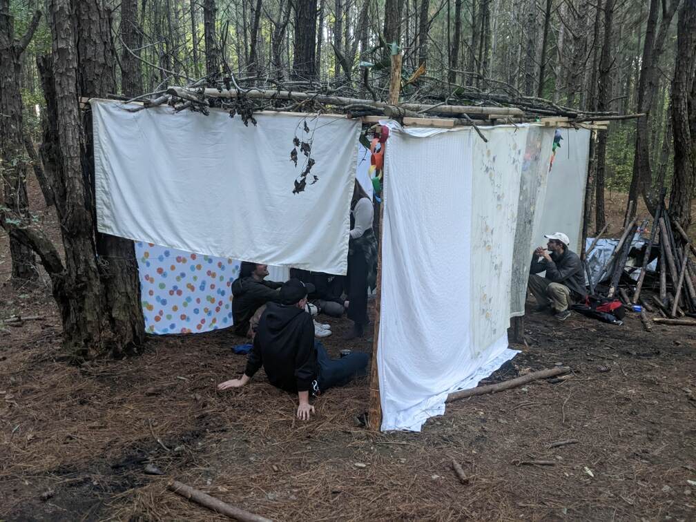 A sukkah constructed in October 2023 at the “Cop City” protest site in the Atlanta forest was destroyed in a police raid in December. (Courtesy of Jewish Bird Watcher Union)