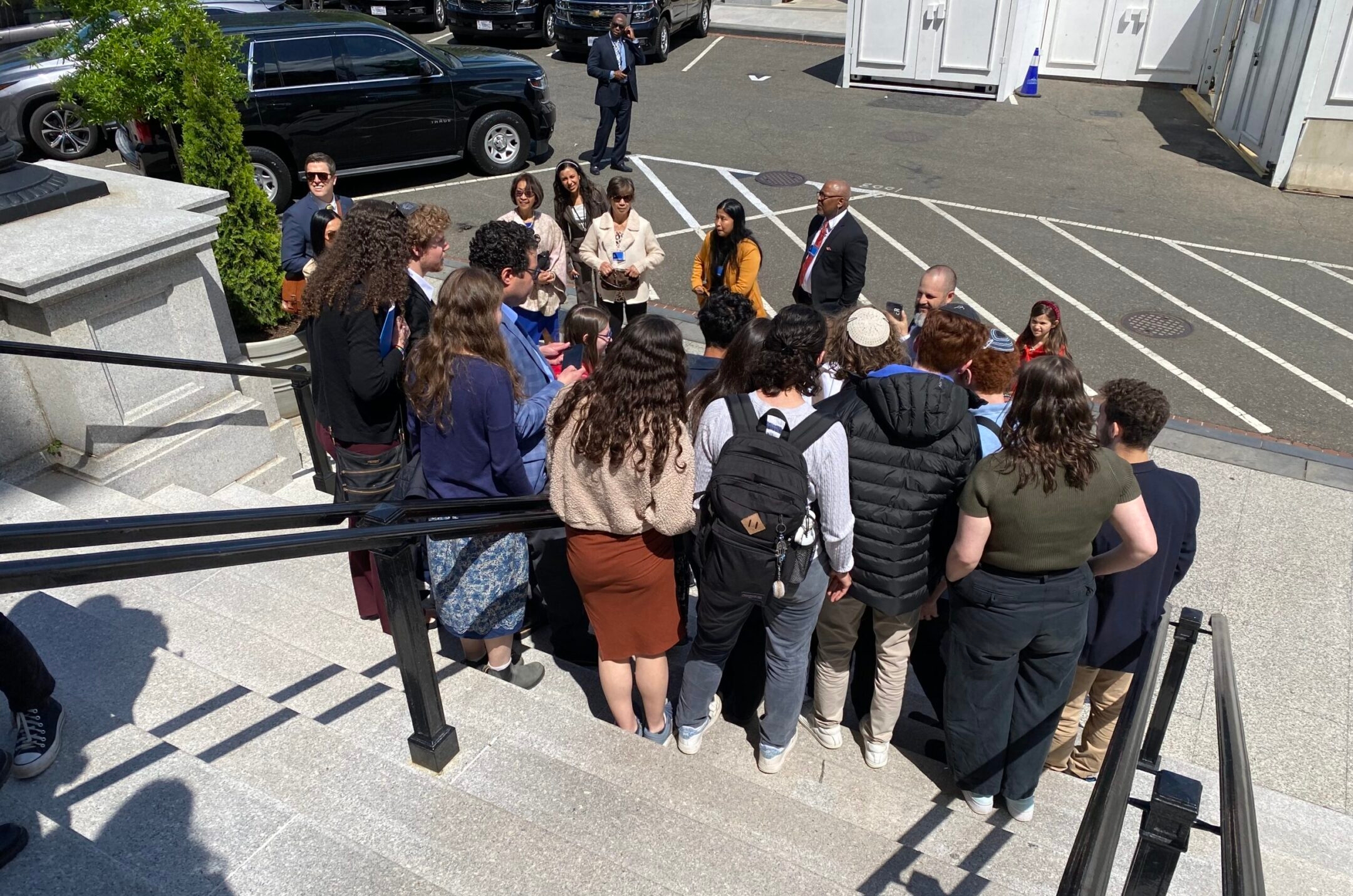 What the Bronfman Youth Fellows’ group photo with Tennessee Rep. Justin Jones looked like from the vantage point of where they’d been sitting before they spotted the prominent lawmaker. (Courtesy of Becky Voorwinde)