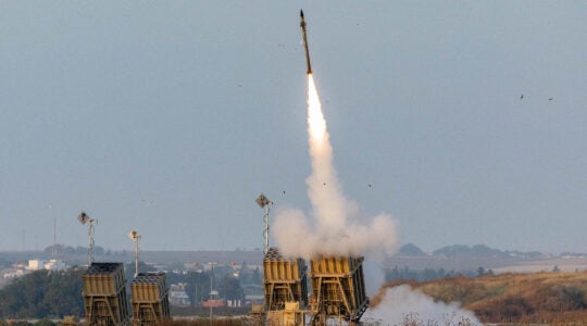 The Iron Dome missile defense system fires interception missiles as rockets are fired from the Gaza Strip toward Israel on May 13, 2023. (Yonatan Sindel/Flash90)