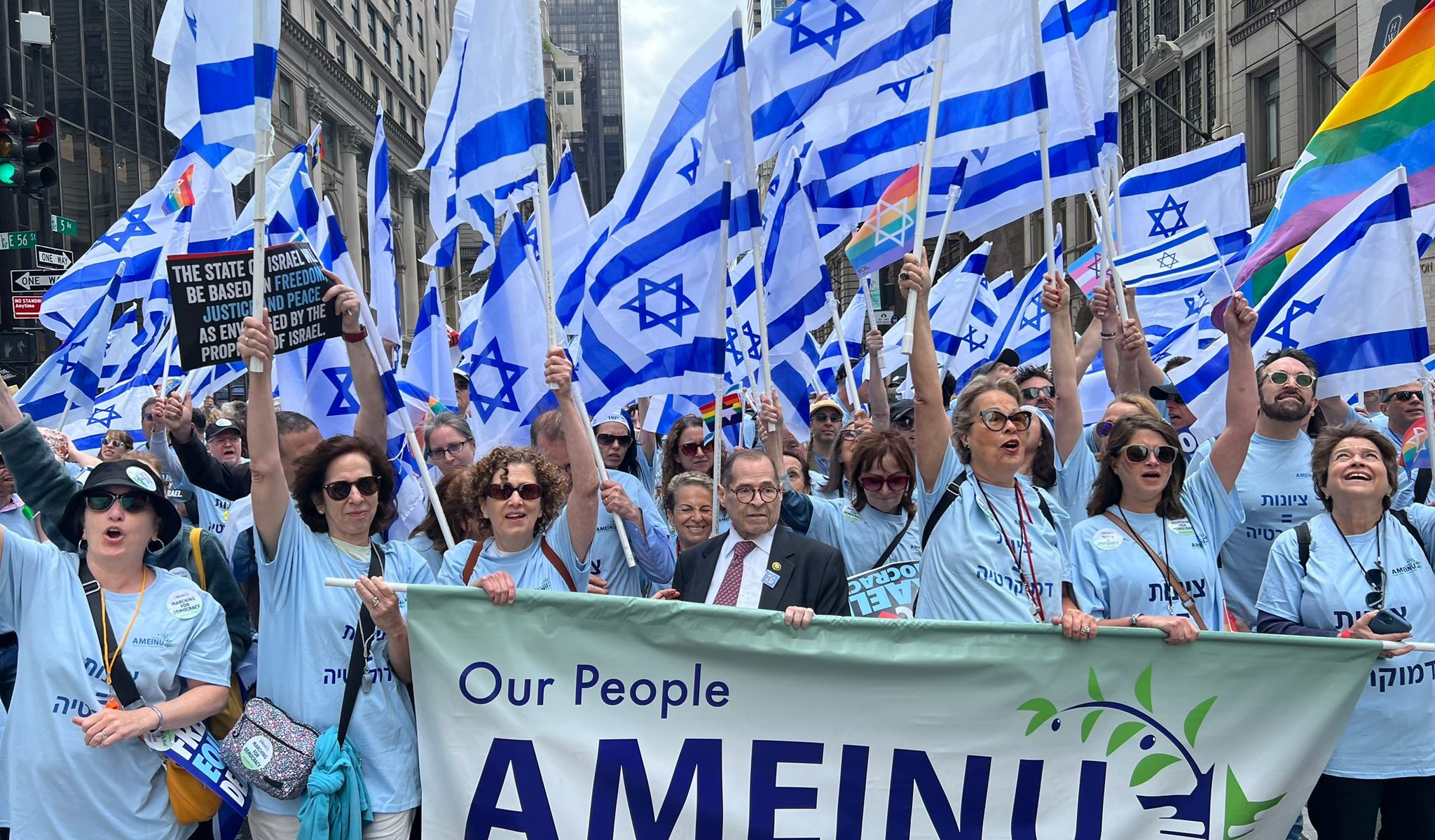 Marchers and demonstrators wave Israel's flag at New York's Celebrate