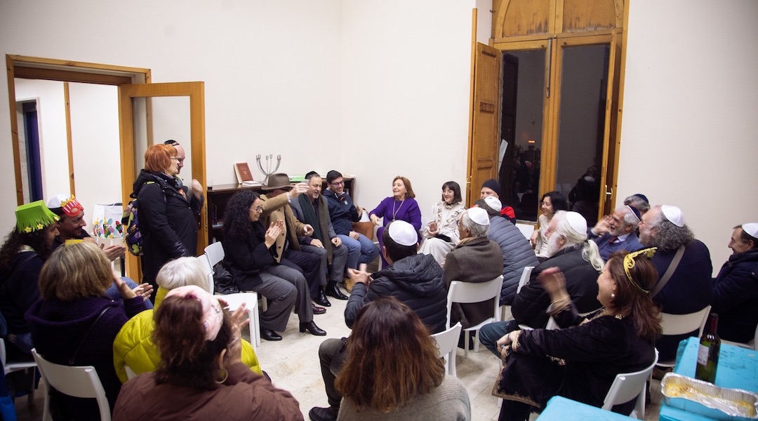 Catania community members are shown at a recent gathering. (David I. Klein)