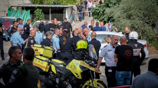 Police at the scene where five people were shot dead in the Arab town of Yafa an-Naseriyye in northern Israel on June 8, 2023. (Fadi Amun/Flash90)