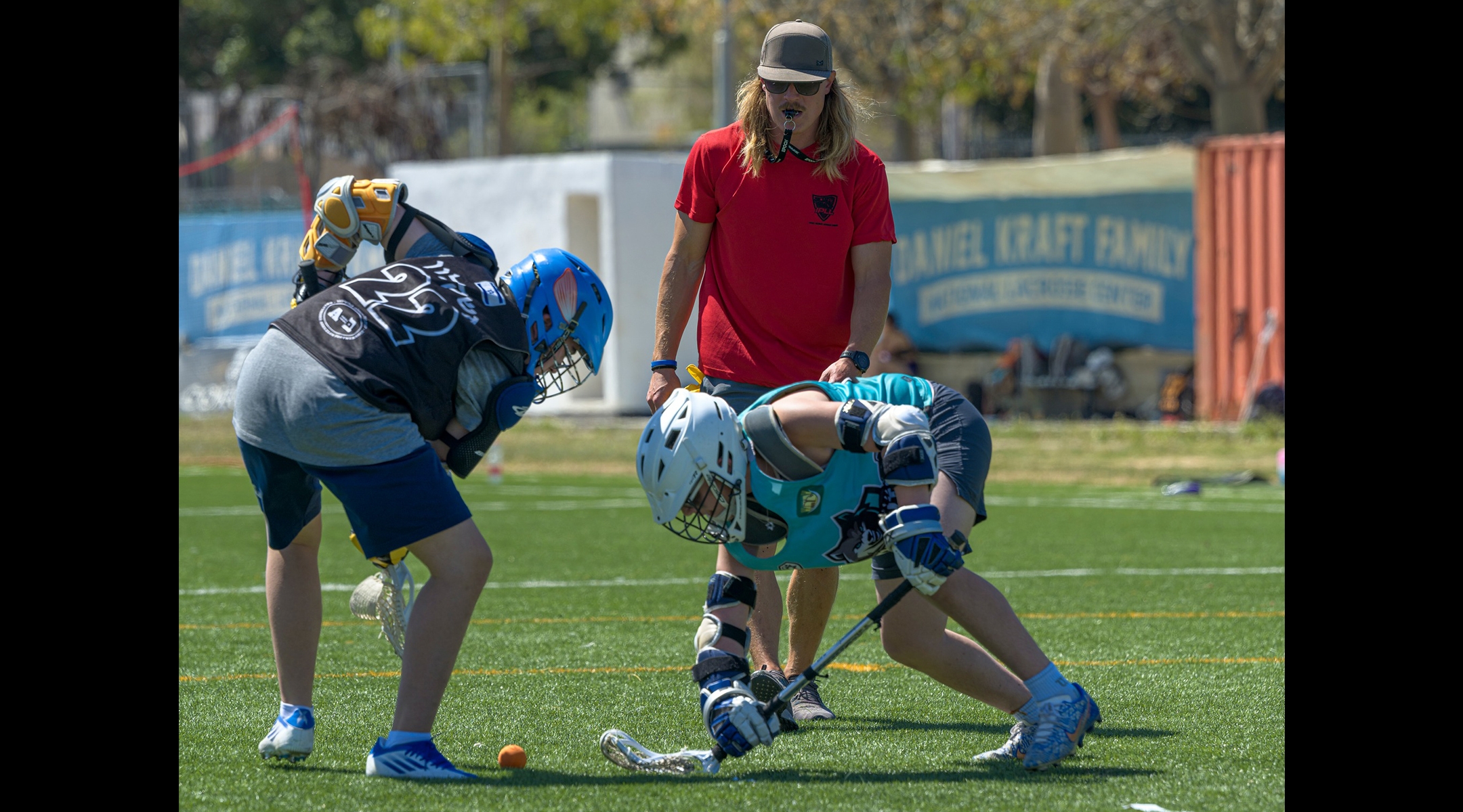 Yakov Silberlicht, in the red shirt, is the director of youth development for Israel Lacrosse. (Courtesy of the Israel Lacrosse Association)