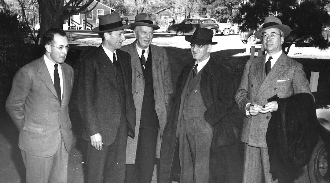 Lewis Strauss, far right, stands slightly apart from his colleagues on the Atomic Energy Commission, including chairman David Lilienthal, second from left, 1947. (Los Alamos National Laboratory)