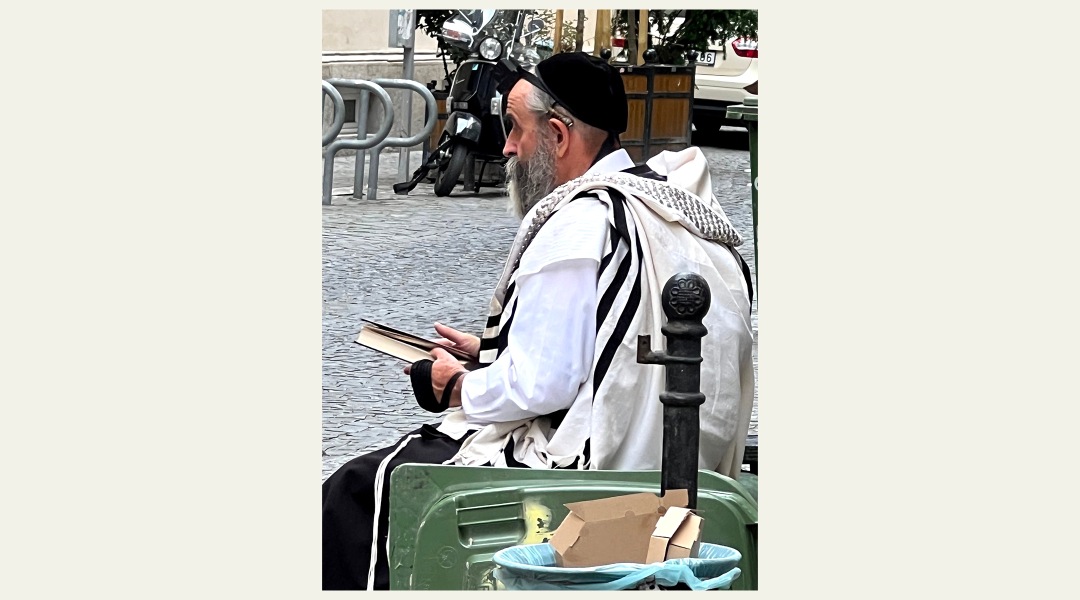 Worshippers hold morning services outside the locked doors of the Kazinczy Street Synagogue in Budapest, Hungary, July 21, 2023. (David Kelsey)