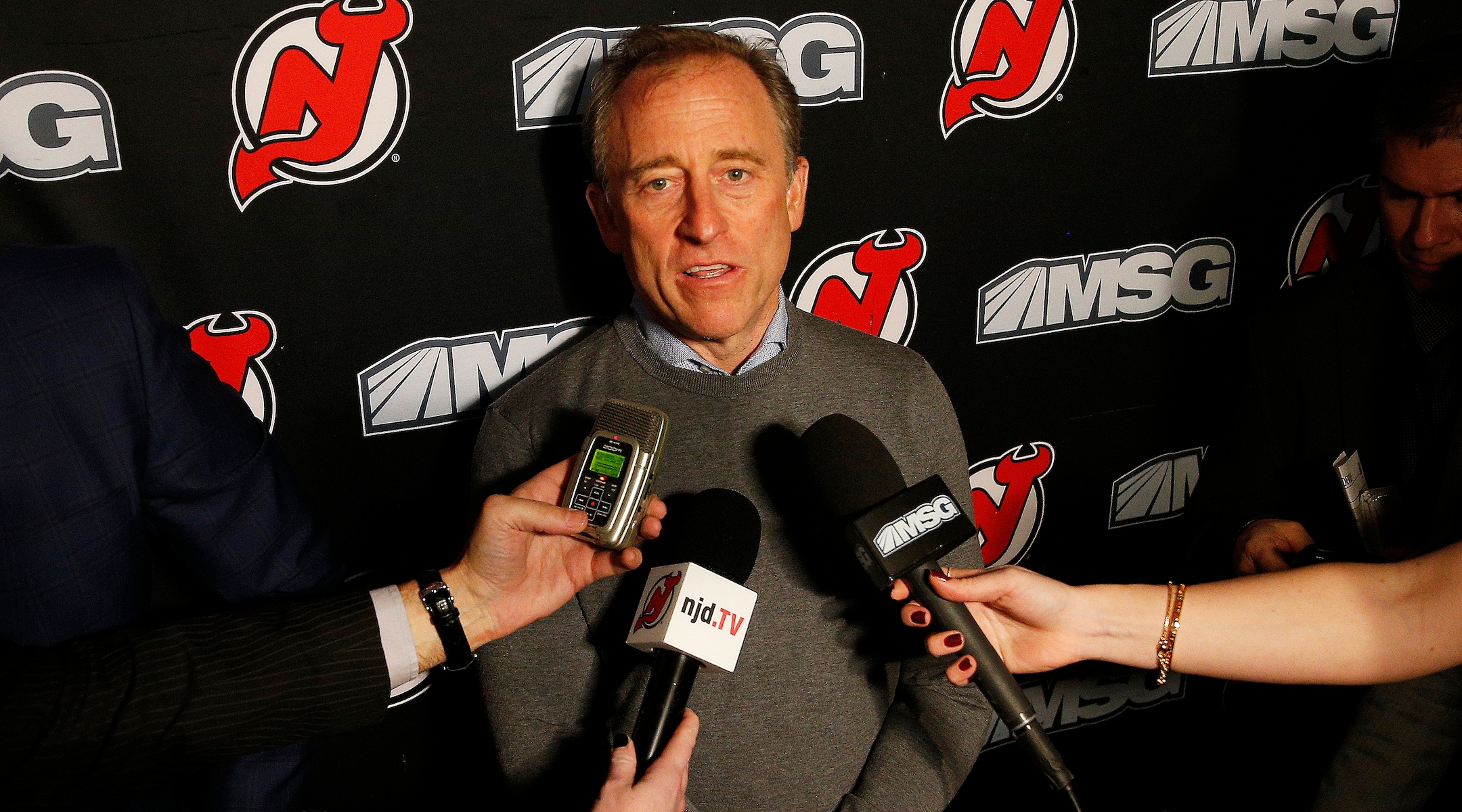 Josh Harris addresses the media at the Prudential Center in Newark, N.J., Jan. 12, 2020. (Andy Marlin/NHLI via Getty Images)