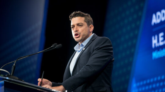 Israeli Minister of Diaspora Affairs Amichai Chikli speaks at an American Jewish Committee conference in Tel Aviv on June 14, 2023. (Miriam Alster/FLASH90)