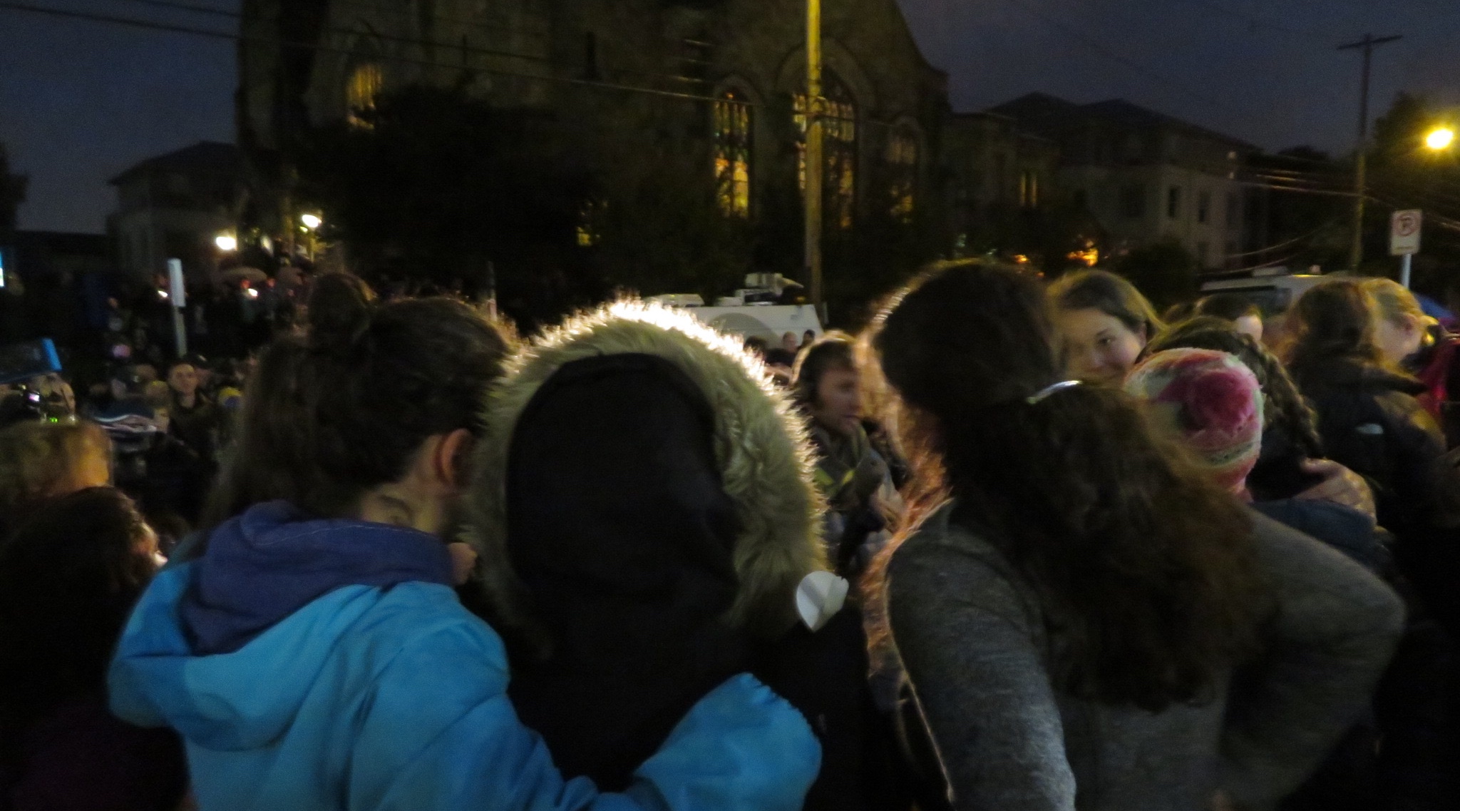 Attendees huddle at a vigil after the massacre at the Tree of Life synagogue in Pittsburgh, Oct. 27, 2018. (Ron Kampeas)