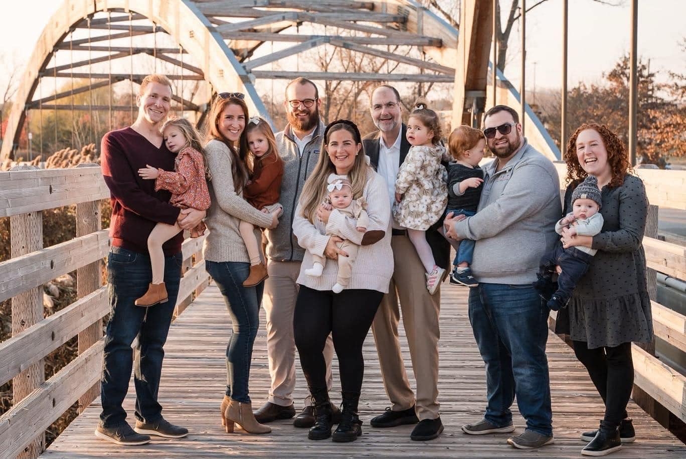 Cantor Philip Sherman poses with his children, their spouses, and his grandchildren in a 2022 family photo. (Courtesy Sherman family)