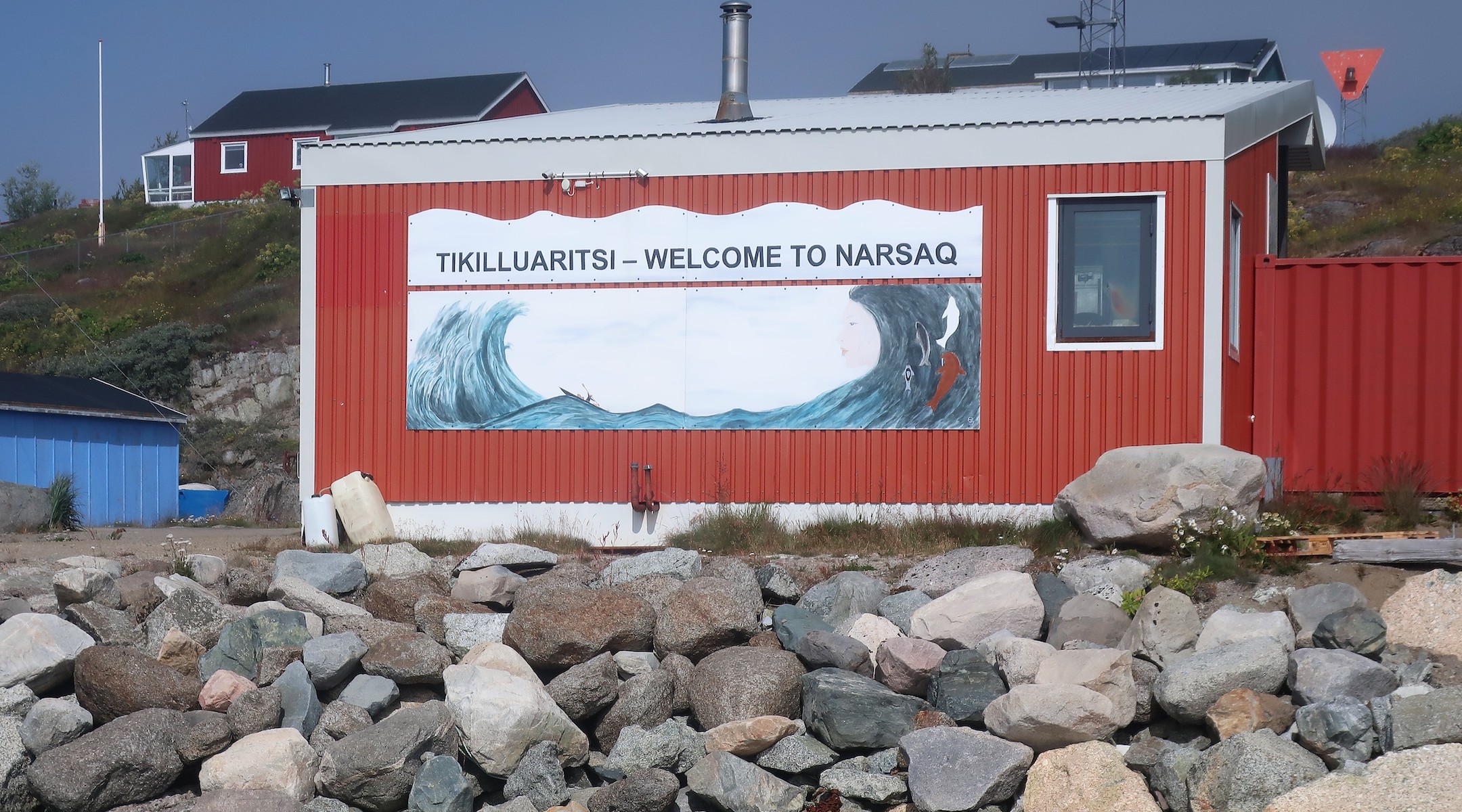 A sign welcomes visitors to Narsaq. (Dan Fellner)