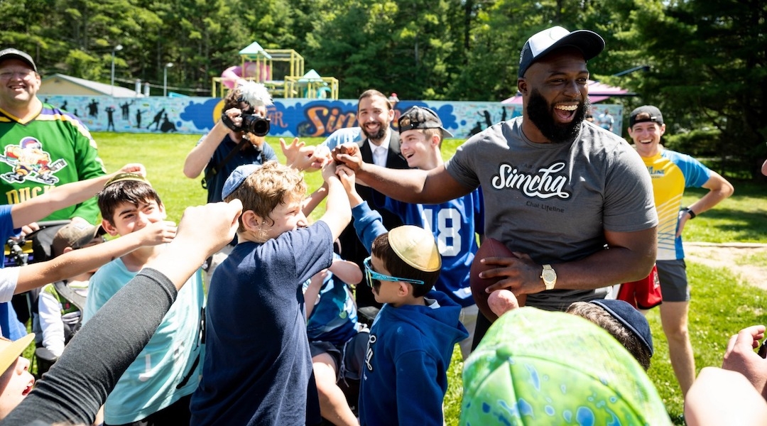 Leonard Fournette with Camp Simcha