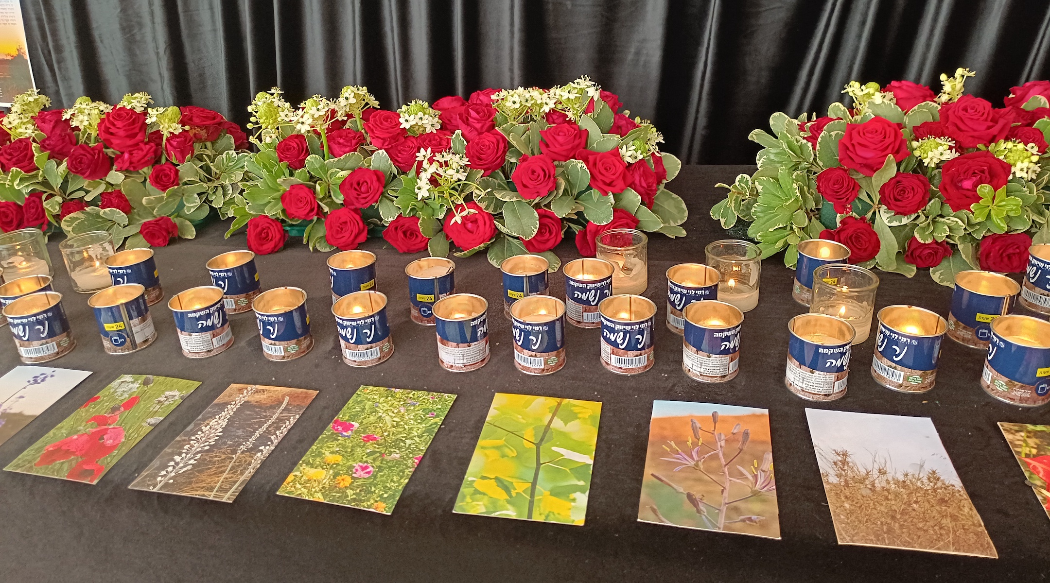 Rows of yizkor, or memorial, candles for the victims of Kibbutz Be'eri at the David Dead Sea Resort. (Eliyahu Freedman)