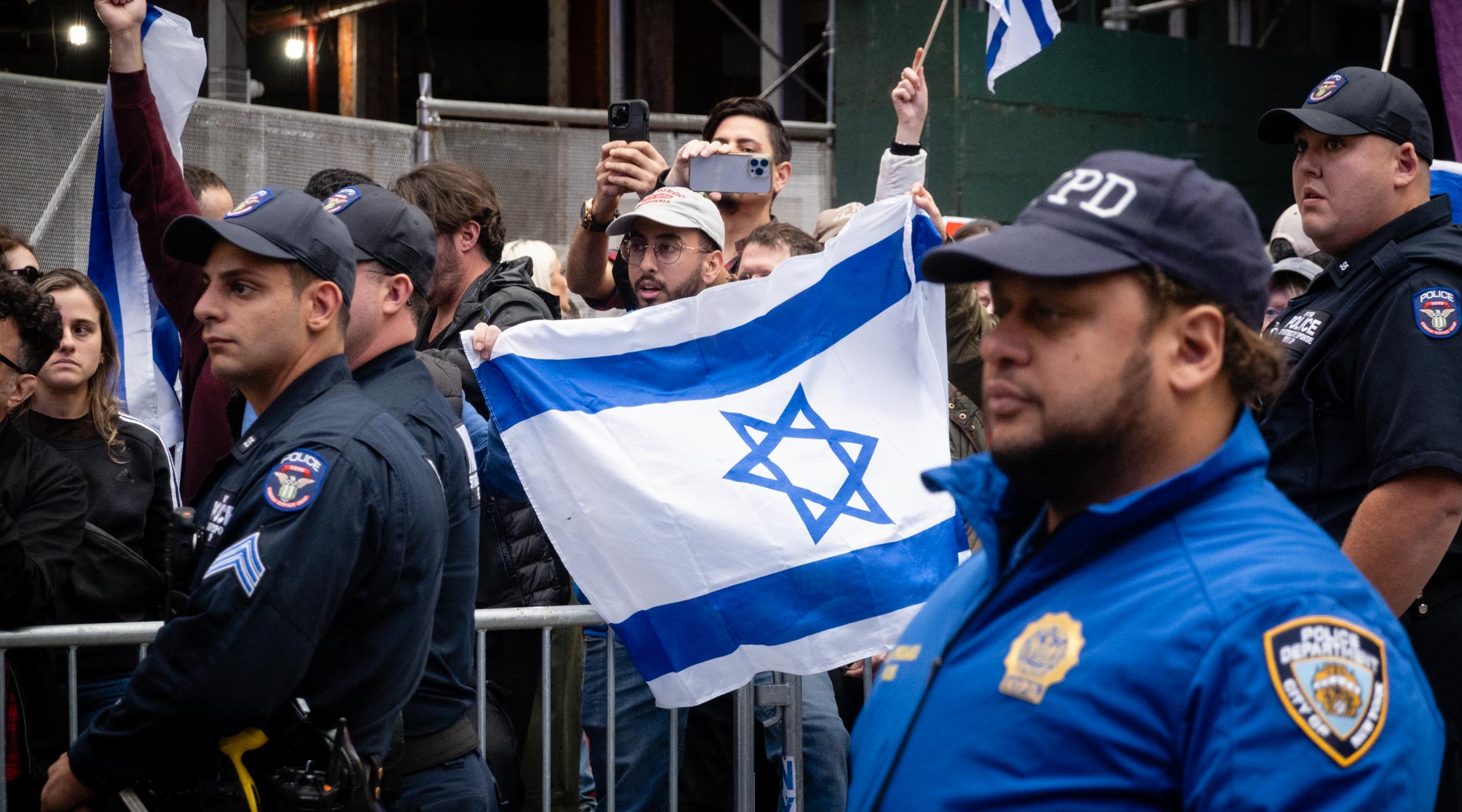 Police protect a group of Israeli and Jewish protesters in New York City, October 8, 2023. (Luke Tress)