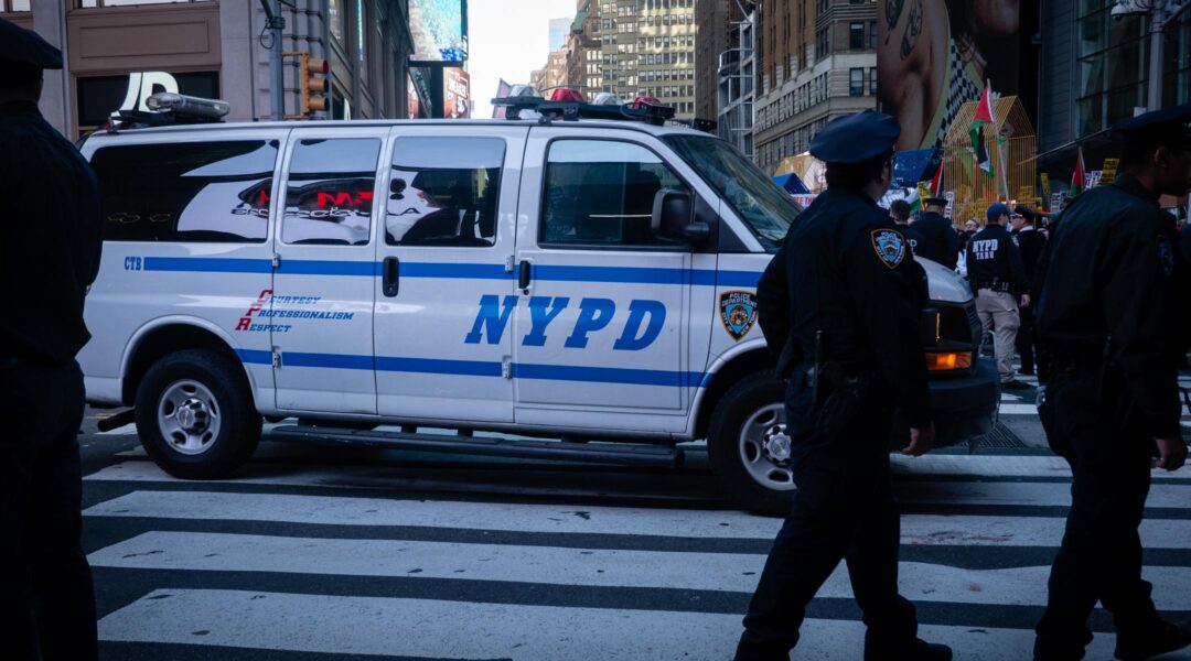 Police separate Israel supporters and pro-Palestinian demonstrators in Times Square, New York City, October 13, 2023. (Luke Tress)