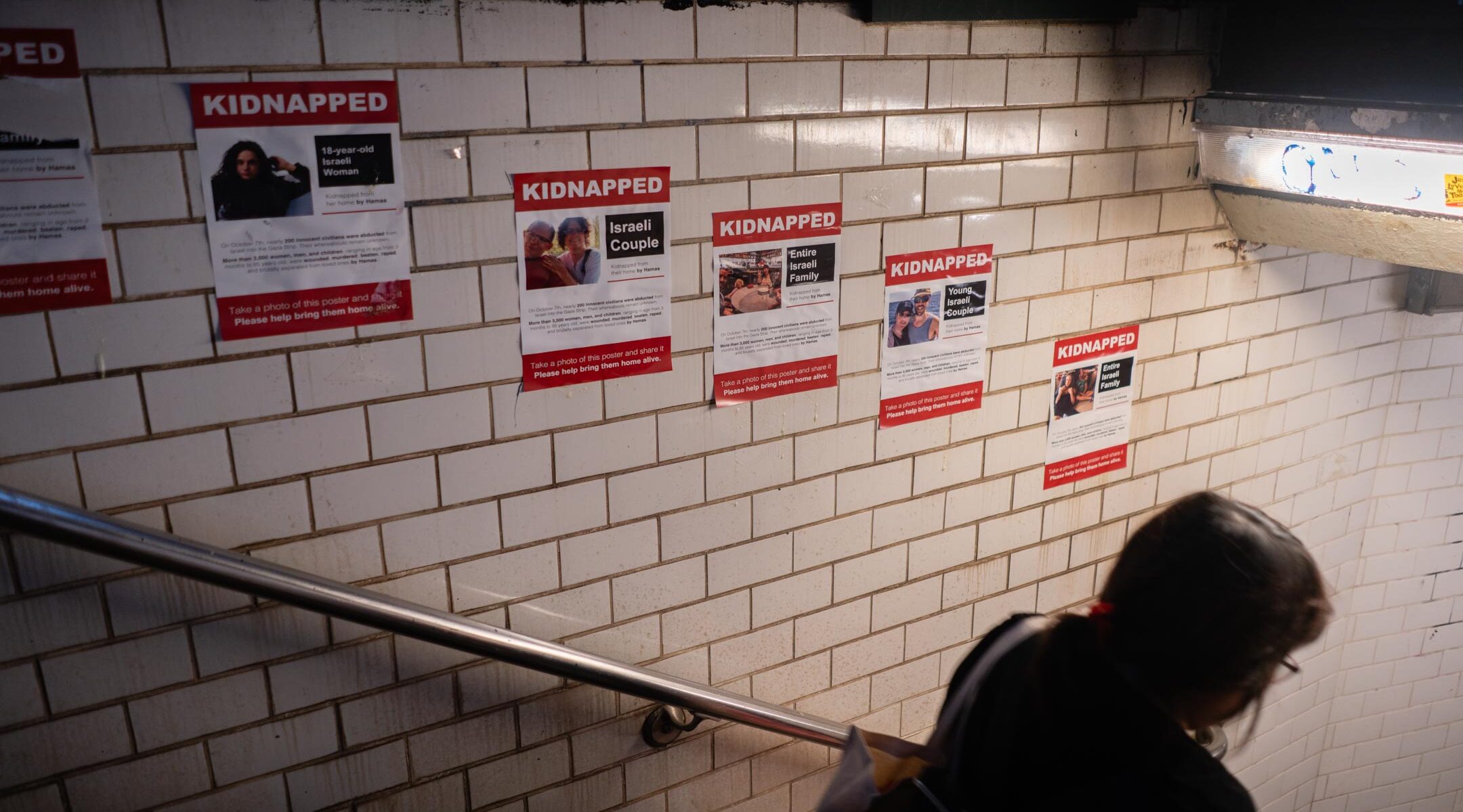 Posters of Israeli hostages in New York City's Union Square subway station, October 16, 2023. (Luke Tress)