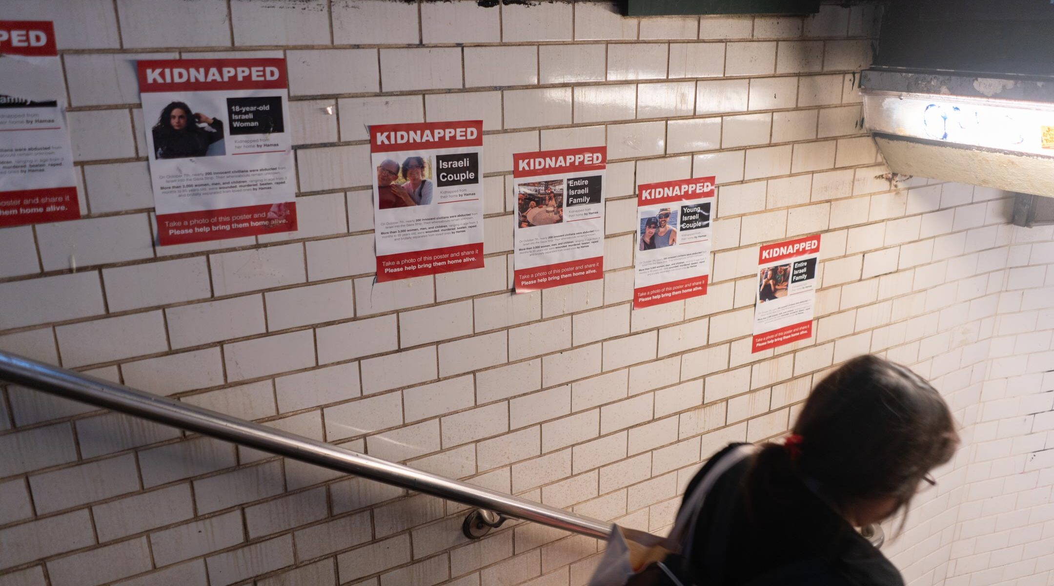 Posters of Israeli hostages in New York City's Union Square subway station, October 16, 2023. (Luke Tress)