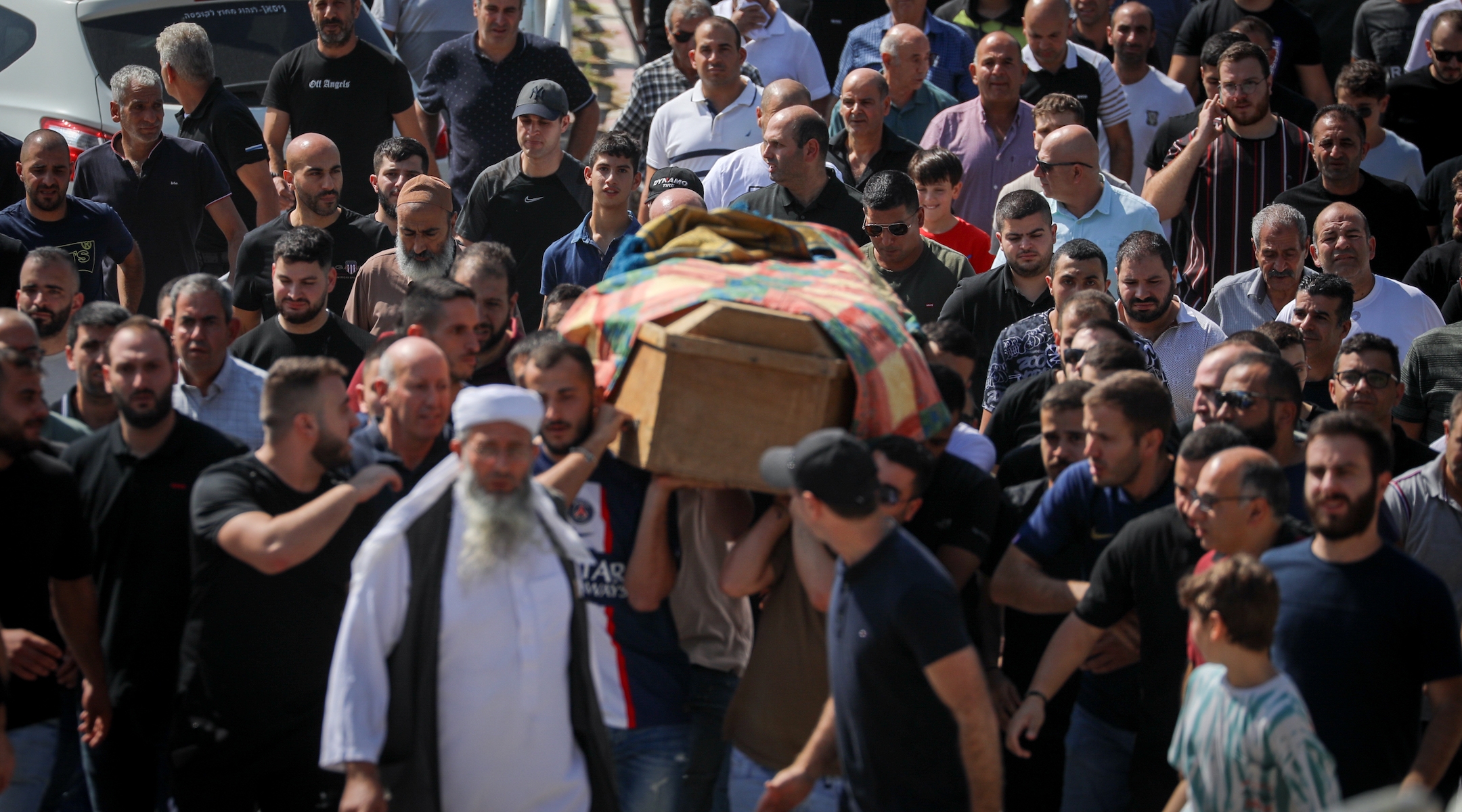 Mourners attend the funeral on October 14, 2023 of an Arab Israeli who was killed when a rocket fired by Hamas hit his house in Abu Gosh, outside of Jerusalem. (Jamal Awad/Flash90)