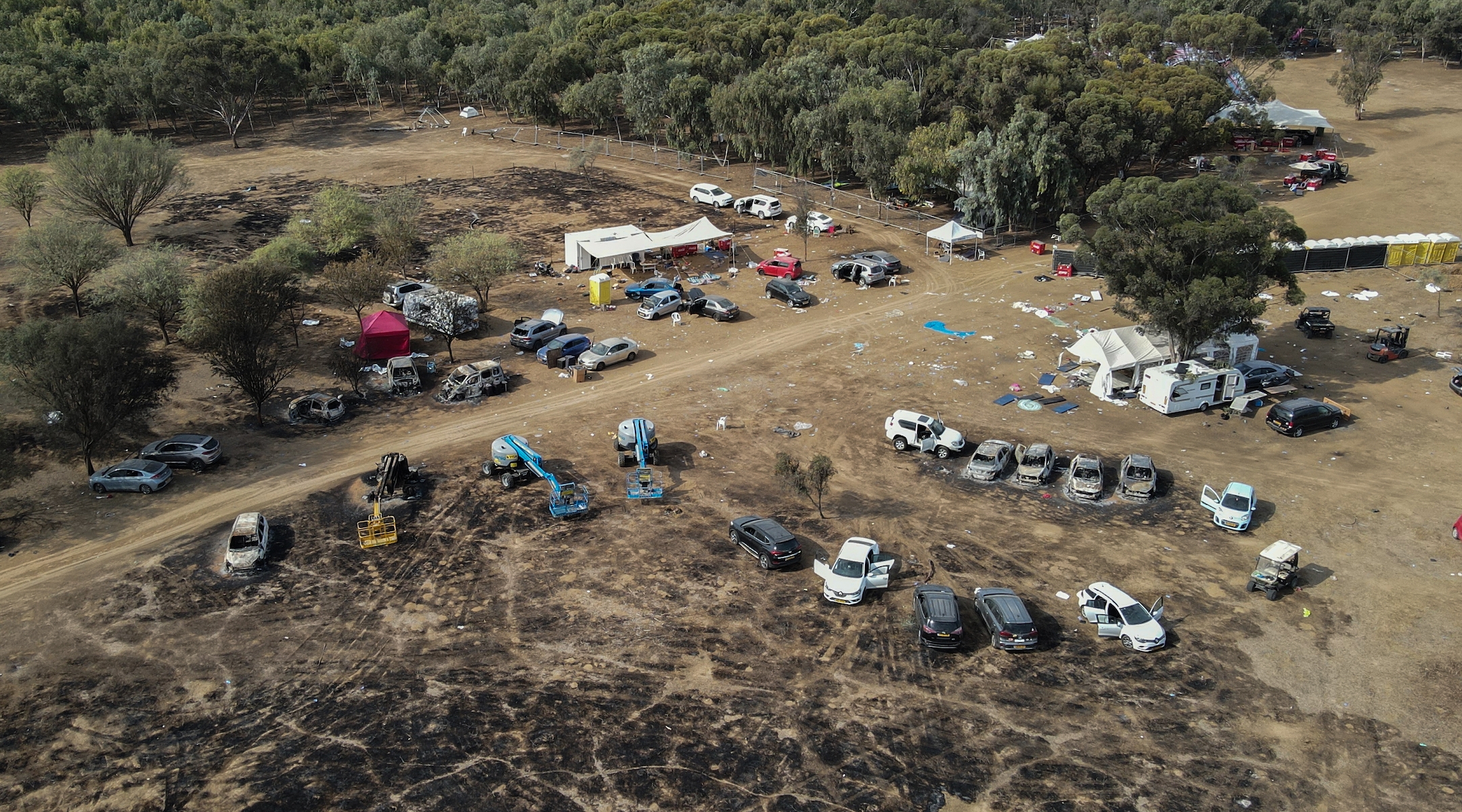 A view of the destruction on the grounds of the Israeli rave. (Ilia Yefimovich/picture alliance via Getty Images)