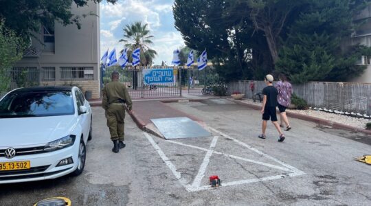 An entrance to a hotel housing evacuees from Israel's southern war zone in Modiin, Israel. (Uriel Heilman)