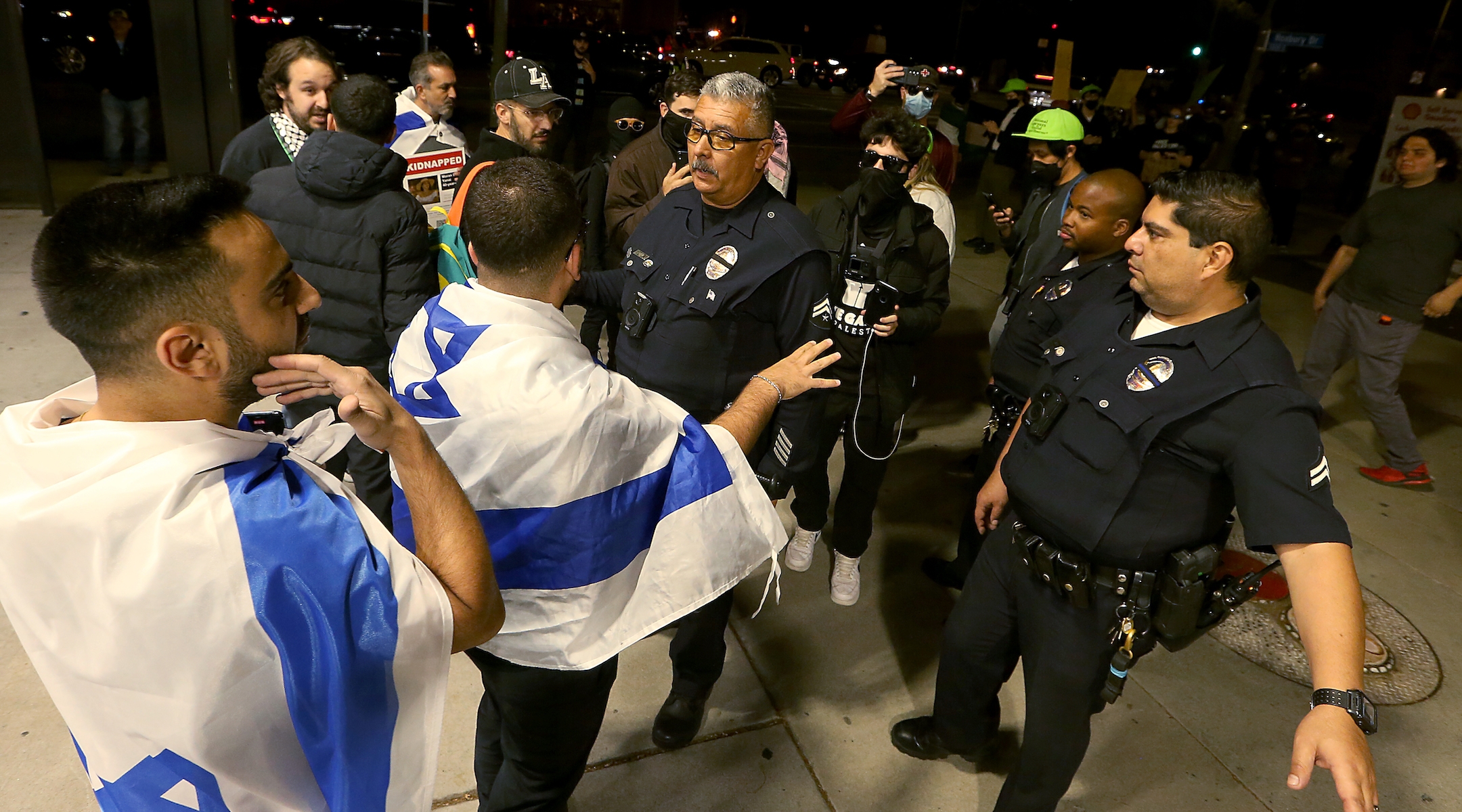 Pro-Israel protesters clash with cops