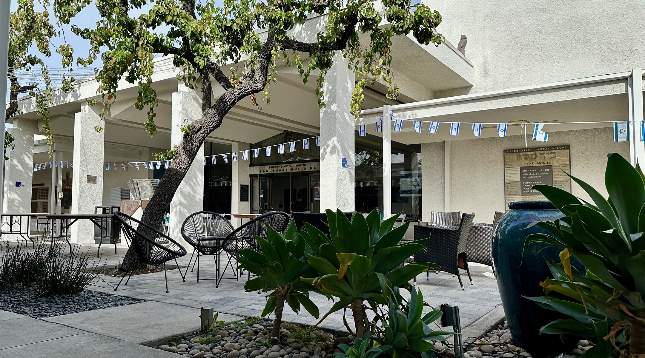 Synagogue courtyard with Israeli flags