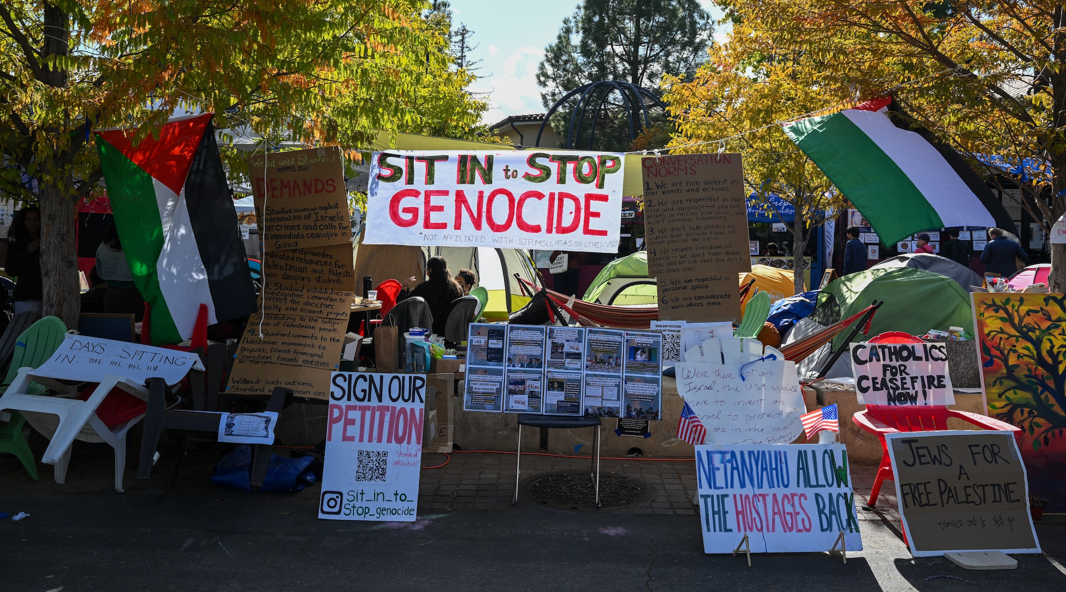 Students camping out with anti-Israel signs