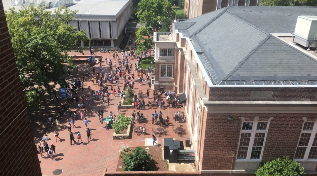Overhead view of students at the University of North Carolina mingling in "The Pit"