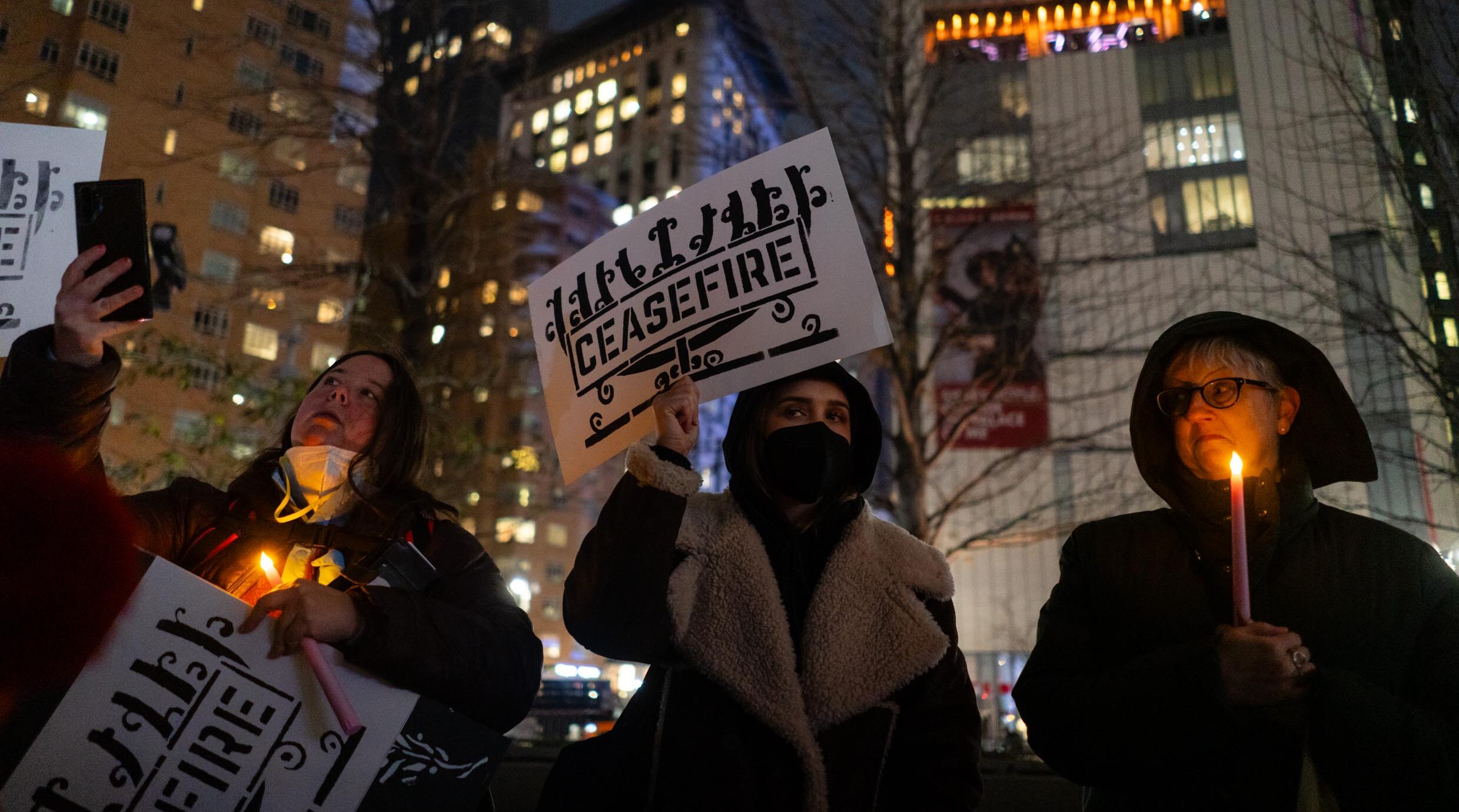 Left-wing activists rally in support of a ceasefire between Israel and Hamas on the first night of Hannukah in Columbus Circle, New York City, Dec. 7, 2023. (Luke Tress)