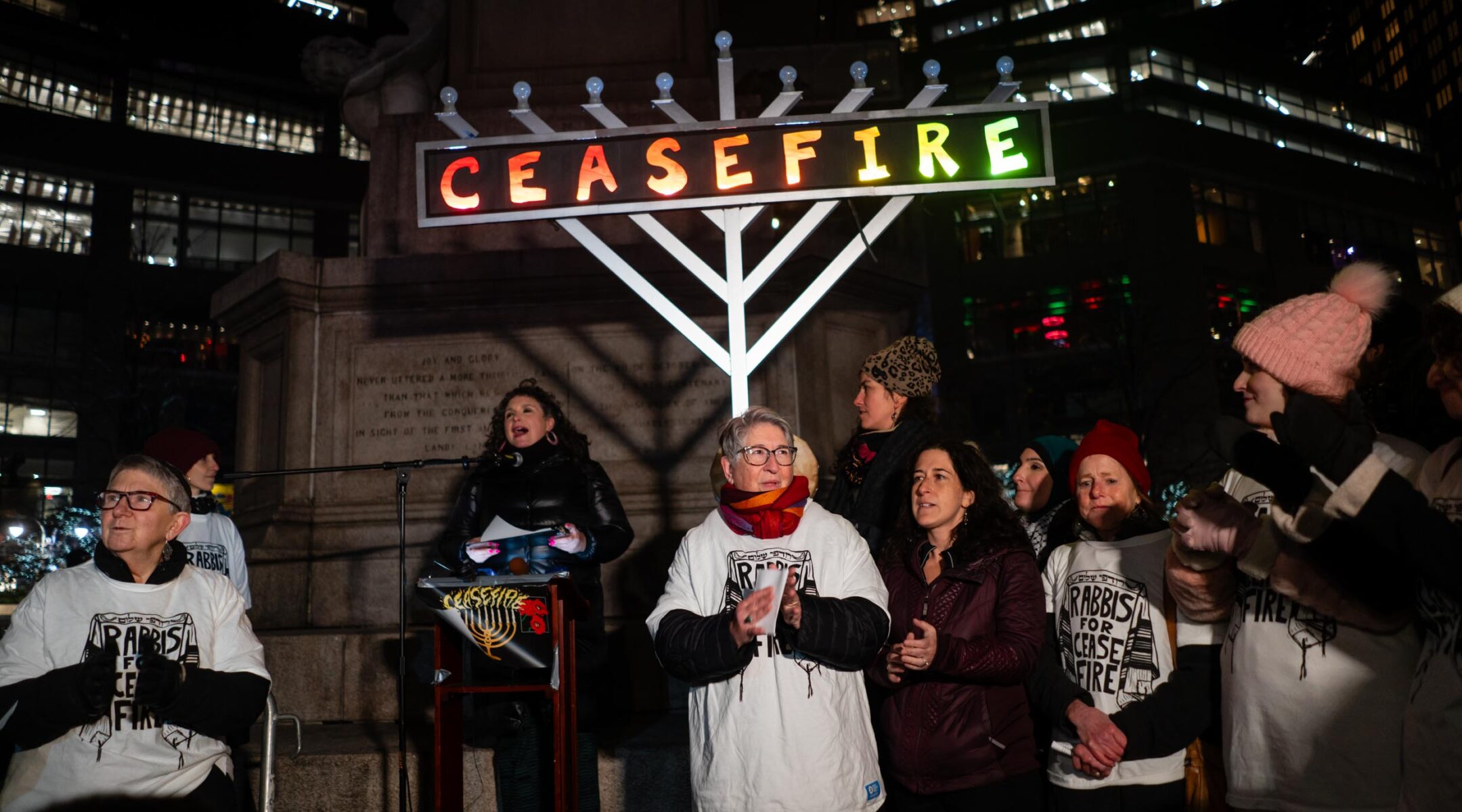 Left-wing activists rally in support of a ceasefire between Israel and Hamas on the first night of Hannukah in Columbus Circle, New York City, Dec. 7, 2023. (Luke Tress)