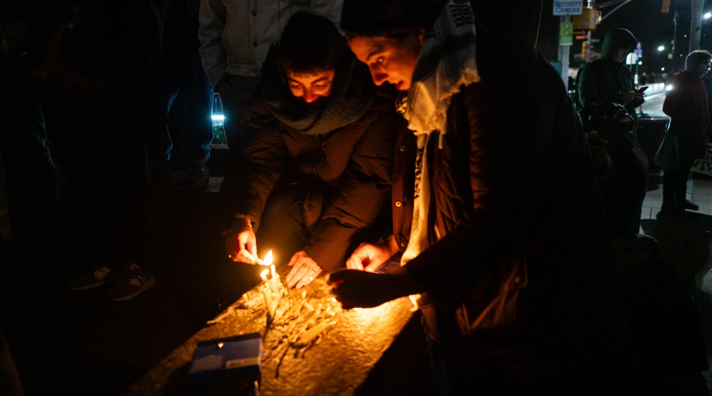 Left-wing activists rally in support of a ceasefire between Israel and Hamas on the first night of Hannukah in Columbus Circle, New York City, Dec. 7, 2023. (Luke Tress)