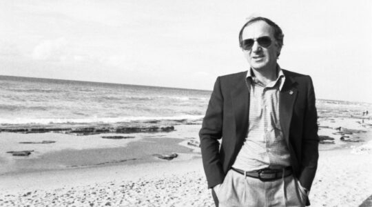 Charles Aznavour on a beach in Jaffa, Israel