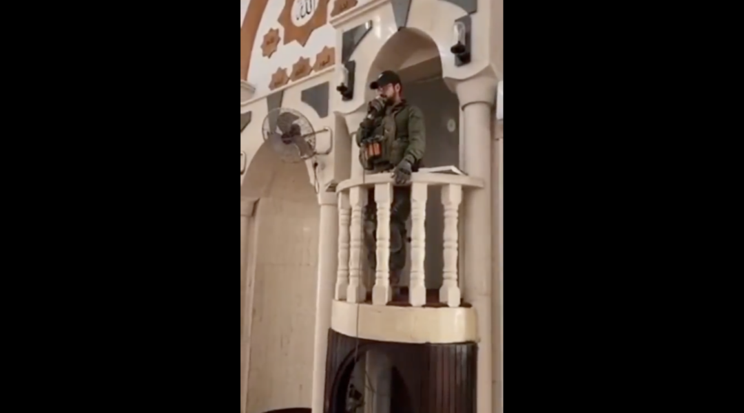 An Israeli soldier can be seen singing from the imam's platform in a Jenin mosque. (Screenshot)