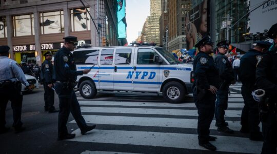 Police separate pro-Israel and pro-Palestinian demonstrators in Times Square, Oct. 13, 2023. (Luke Tress)