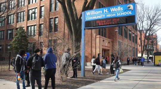 Students stand outside a Chicago public school