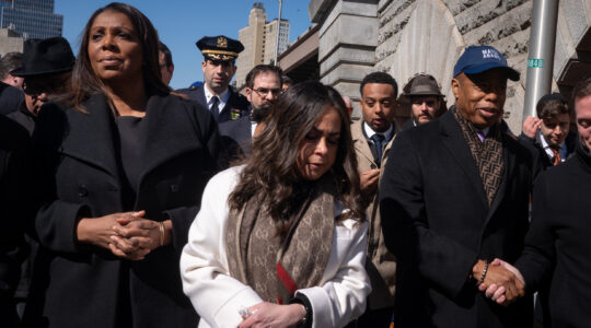 Devorah Halberstam, center, at a Brooklyn Bridge ceremony marking 30 years since her son's death. At left is New York Attorney General Letitia James and at right, New York City Mayor Eric Adams, March 1, 2024. (Luke Tress)