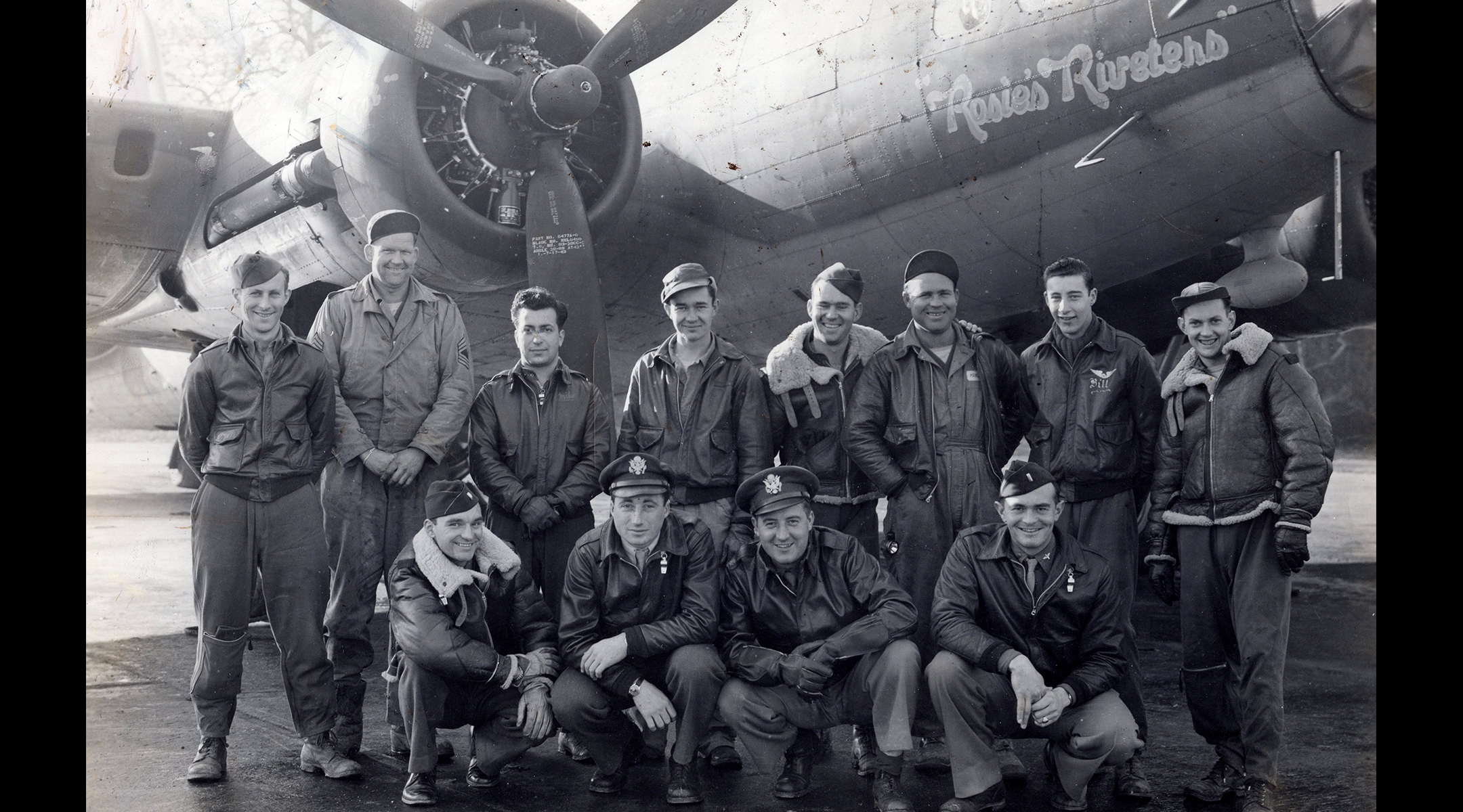 Group shot in front of air force plane