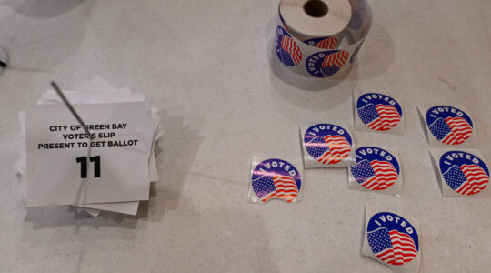 Voting stickers at a polling station in Green Bay, Wisconsin, April 2, 2024. (Joshua Lott/The Washington Post via Getty Images)