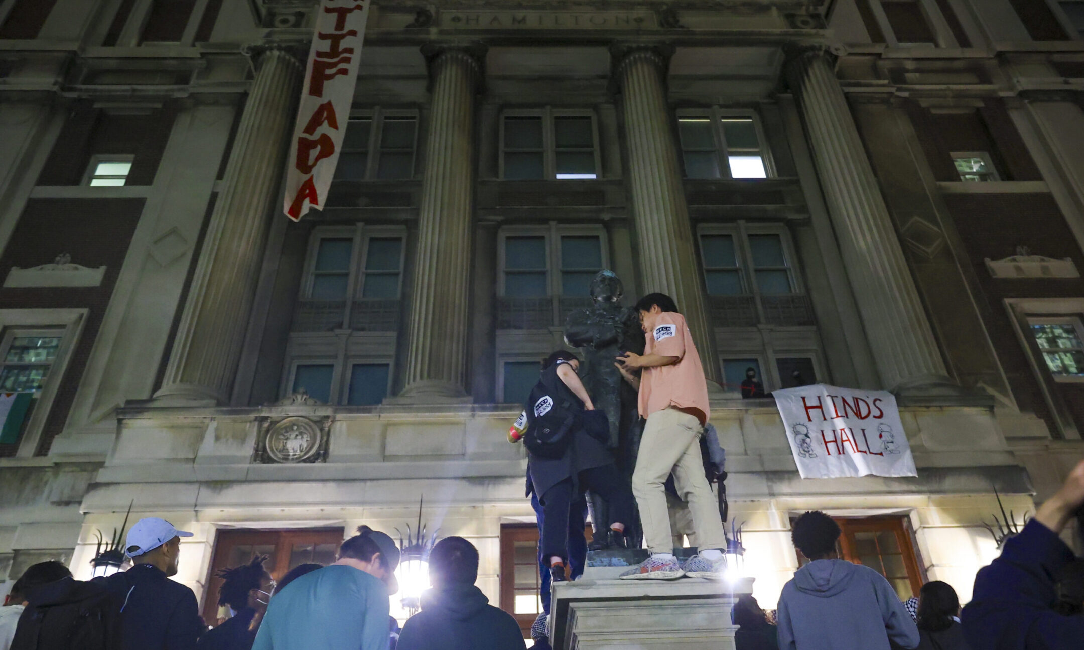 Northwestern students agree to dismantle anti-Israel encampment, as Columbia protesters take over university building