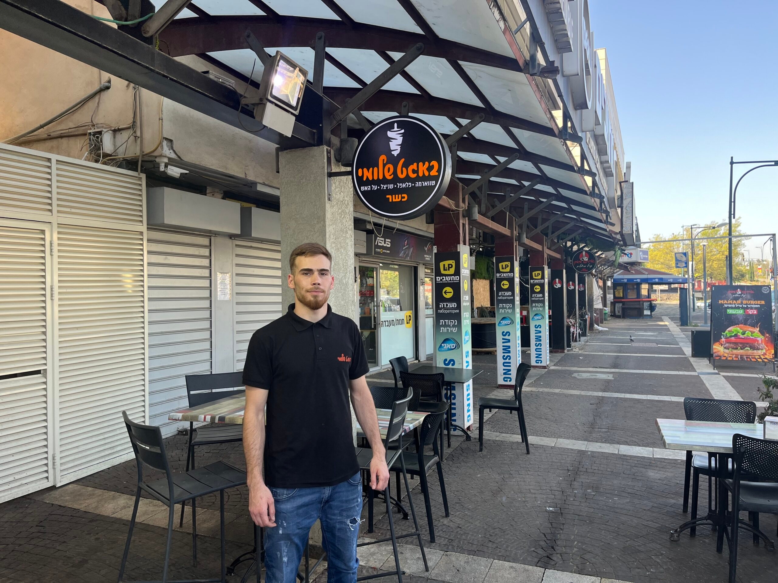 Despite missiles and an evacuation order, the spit is still turning at this northern Israel shawarma shop