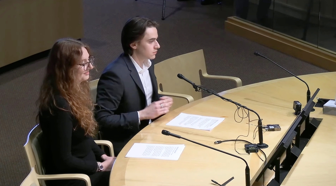 Two Jewish students present to a university board