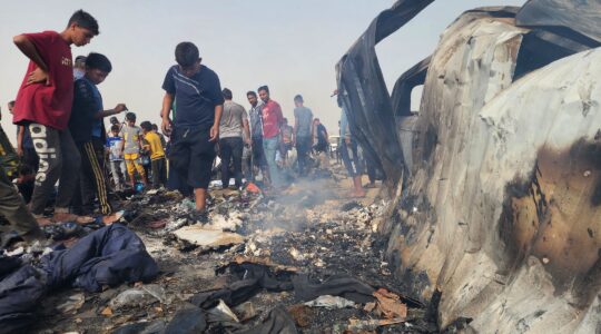An Israeli strike on a displaced persons camp in Rafah, targeting Hamas leaders, killed dozens on Sunday, May 26. (Hani Alshaer/Anadolu via Getty Images)