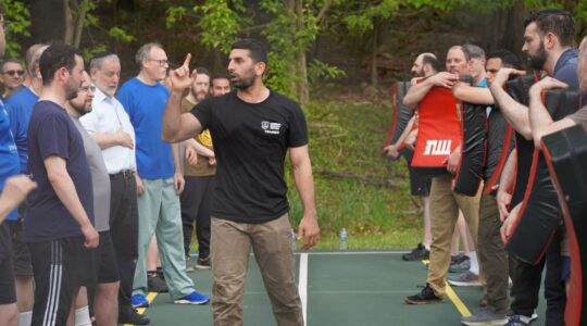 A krav maga instructor trains synagogue security volunteers at a retreat in Pennsylvania, May 6, 2024. (Courtesy)