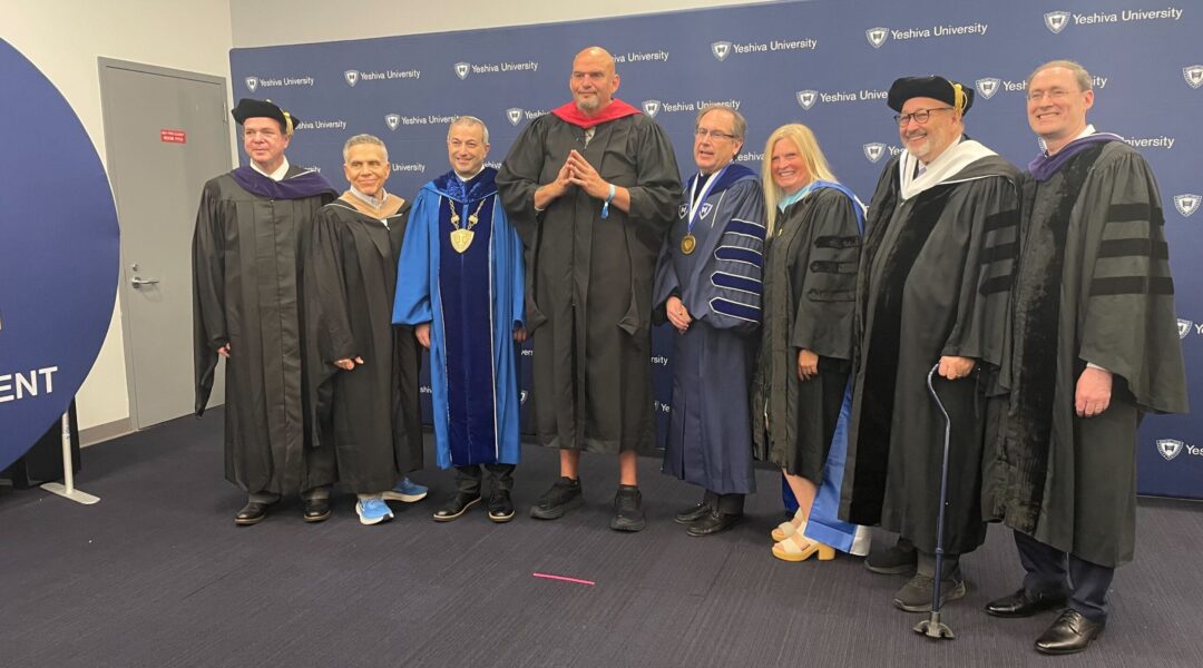 Sen. Jon Fetterman, center, with Yeshiva University leadership, ahead of the university's commencement ceremony in Queens, May 29, 2024. (Luke Tress)
